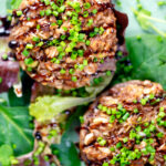 Overhead close-up brown rice stuffed mushrooms with cheddar cheese and balsamic.