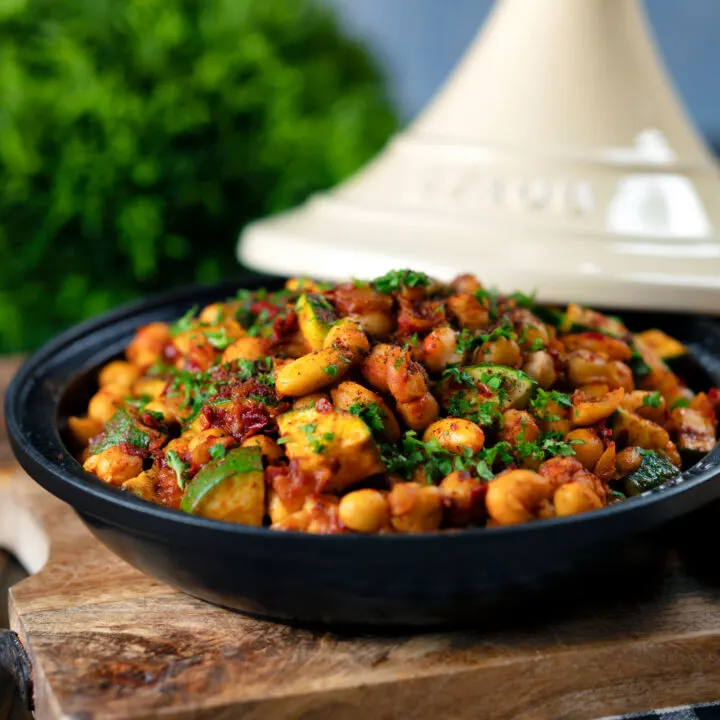 Vegetarian chickpea tagine with courgettes, harissa and preserved lemons.