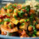 Close-up chickpea tagine with courgettes, harissa, almonds and preserved lemons, featuring a title overlay.