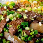 Close-up Chinese takeaway style beef curry served with egg fried rice featuring a title overlay.