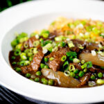Chinese takeaway style beef and onion curry served with egg fried rice.