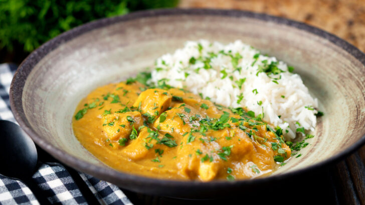 Fruity and spicy pineapple chicken curry served with rice and naan bread.