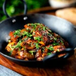 Spicy halloumi curry served with chapatis, mint raita and kachumber salad.