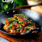 Spicy halloumi curry served with chapatis, mint raita and kachumber salad, featuring a title overlay.