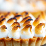 Individual lemon meringue pie with Italian meringue.