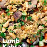 Overhead close-up lamb kabsa, Saudi Arabian rice with almonds and raisins featuring a title overlay.