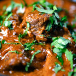Close up lamb madras curry fakeaway.