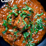 Overhead close-up lamb madras curry fakeaway with fresh coriander featuring a title overlay.