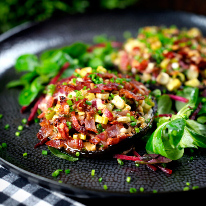 Bacon stuffed flat mushrooms with spring onions, Lancashire cheese and sun-dried tomatoes.