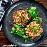 Overhead bacon stuffed mushrooms with Lancashire cheese and snipped chives featuring a title overlay.