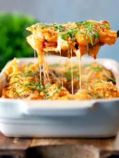 Cheesy chicken and chorizo sausage pasta bake with a parmesan crust.