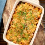 Overhead chicken and chorizo sausage pasta bake with a parmesan crust.