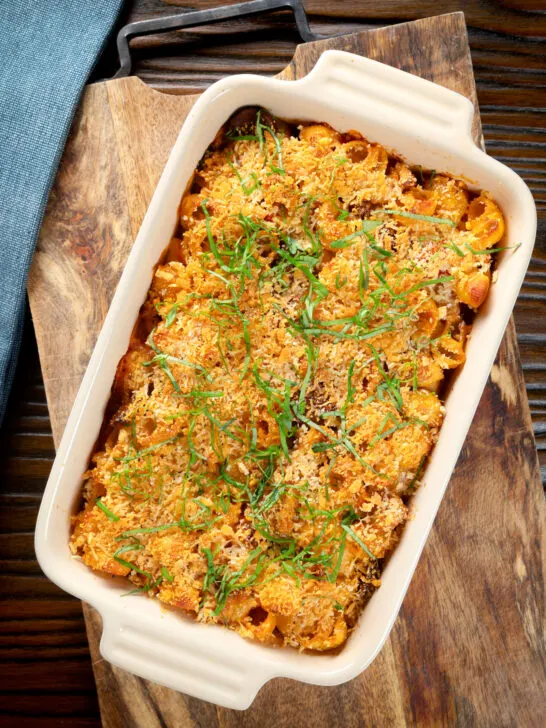 Overhead chicken and chorizo sausage pasta bake with a parmesan crust.