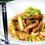 Ginger chicken with garlic and spring onions served with egg fried rice.