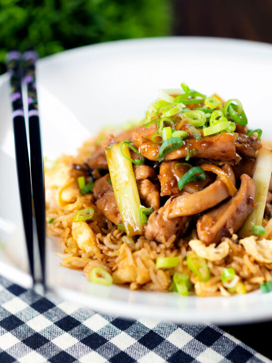 Ginger chicken with garlic and spring onions served with egg fried rice.