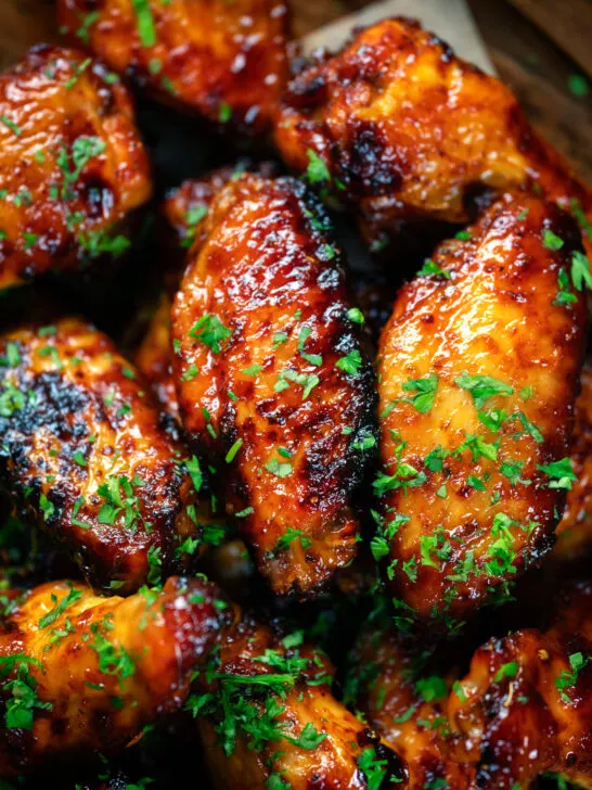 Overhead close-up honey and sriracha glazed chicken wings.