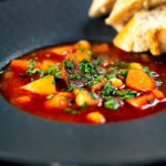 Traditional Hungarian goulash soup or Gulyásleves with csipetke (pasta).