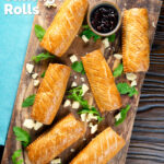 Overhead homemade pork and apple sausage rolls with golden hot crust pastry, featuring a title overlay.