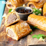 Homemade pork and apple sausage rolls with hot crust pastry cut open to show filling, featuring a title overlay.