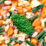 Overhead close-up French soupe au pistou veggie soup.