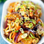 Vegan sweet and sour vegetable and udon noodles stir fry.