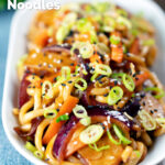 Vegan sweet and sour vegetable and udon noodles stir fry, featuring a title overlay.