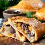 Traditional Cornish pasty cut open to show filling of beef, swede, potato and onions featuring a title overlay.