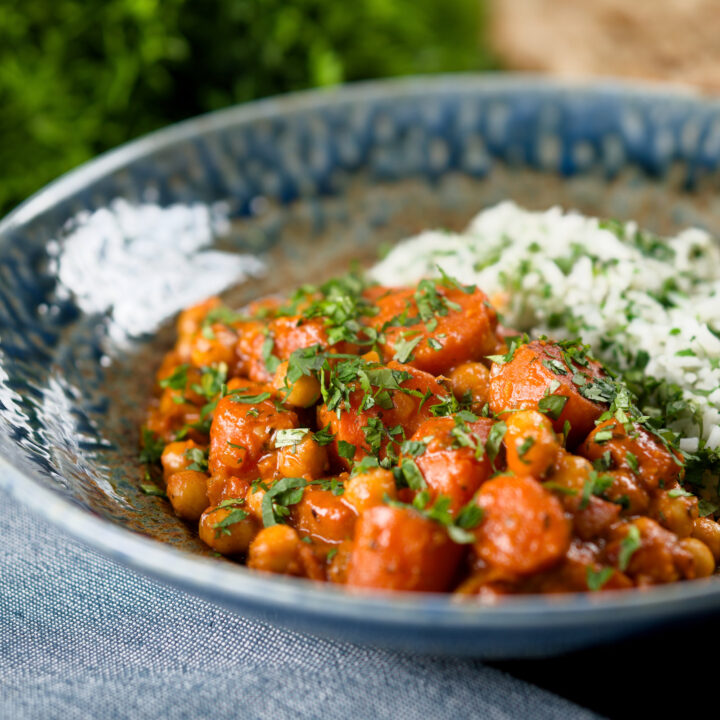 Indian inspired vegan carrot and chickpea curry served with coriander rice.