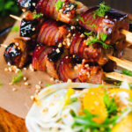 Marmalade glazed duck kebabs served with a fennel and orange salad.