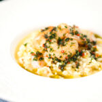 Lemon and prawn risotto with chilli and parsley.