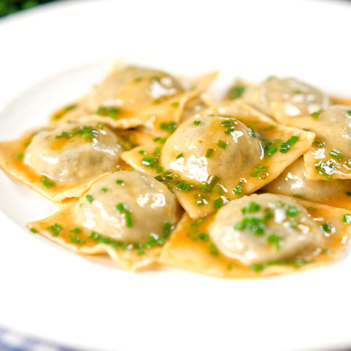 Homemade mushroom filled ravioli with a marsala wine, butter and chive sauce.