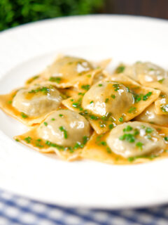 Homemade mushroom filled ravioli in a marsala wine, butter and chive sauce.