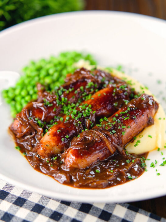 Devilled sausages in a spicy onion gravy with mashed potato and peas.