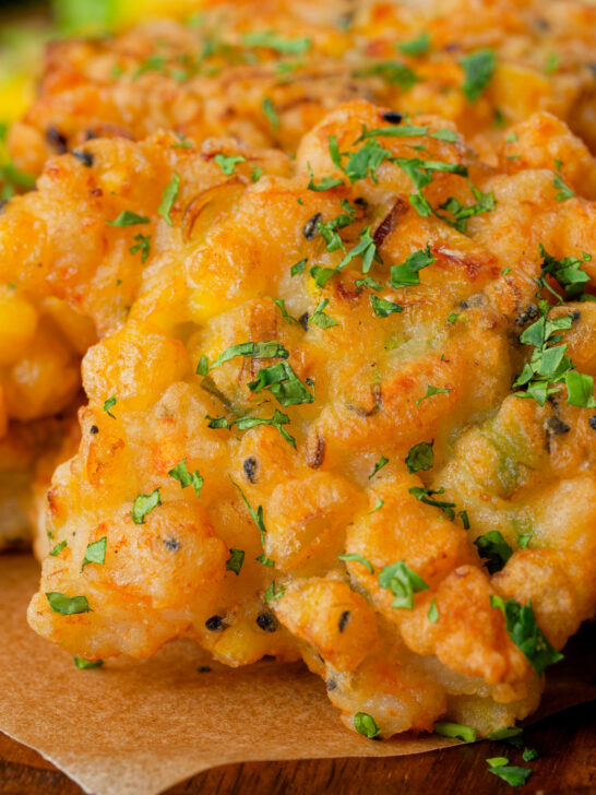 Close-up fried prawn or shrimp and sweetcorn fritters.