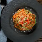 Overhead one-pot spicy fried spaghetti all assissina or bruciati.