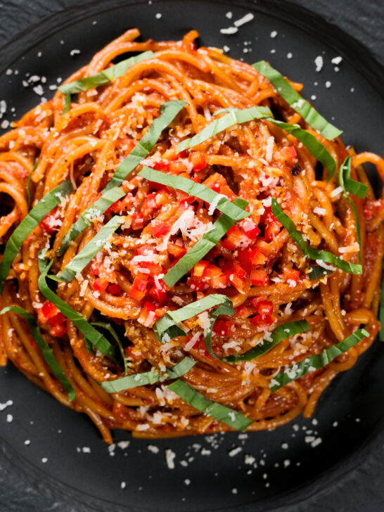 Close-up overhead one-pot spicy fried spaghetti all'assissina or bruciati.