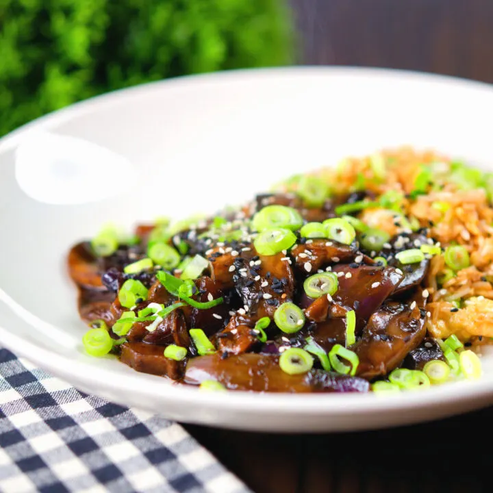 Stir fried teriyaki mushrooms served with egg fried rice.