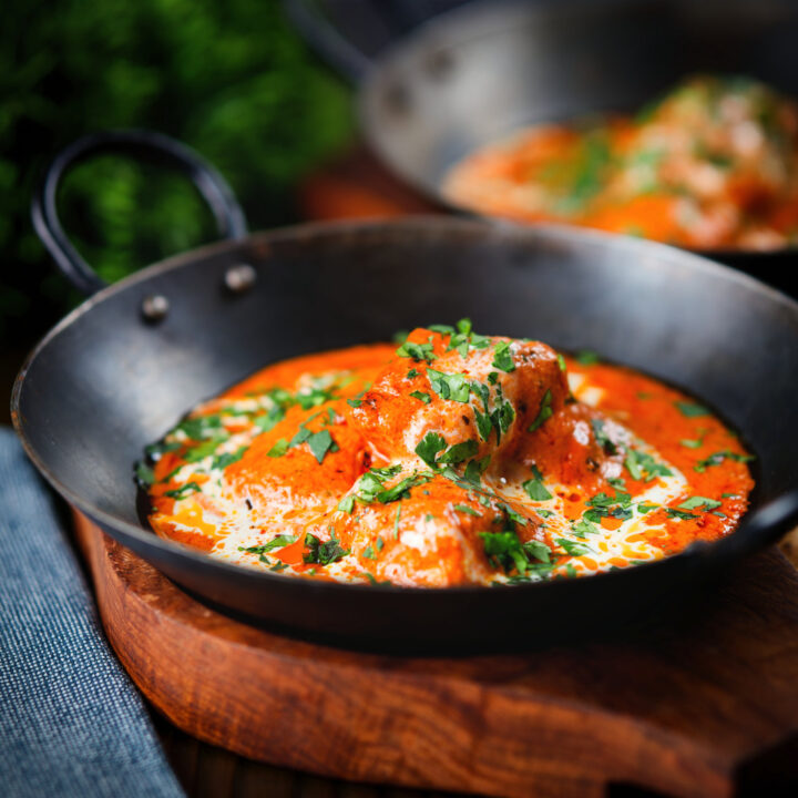 Indian butter chicken curry or murgh makhani with fresh coriander.