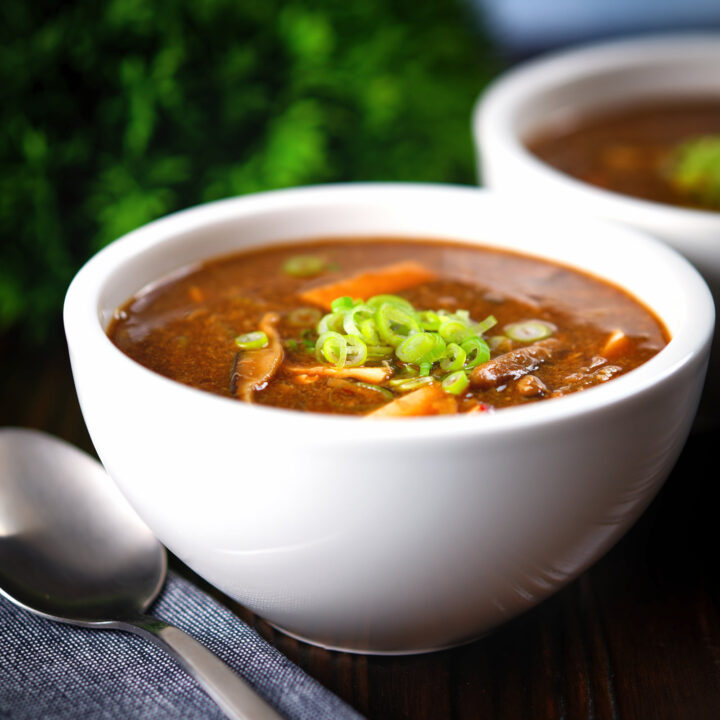 Vegetarian Chinese hot and sour soup with shiitake mushrooms and silken tofu.