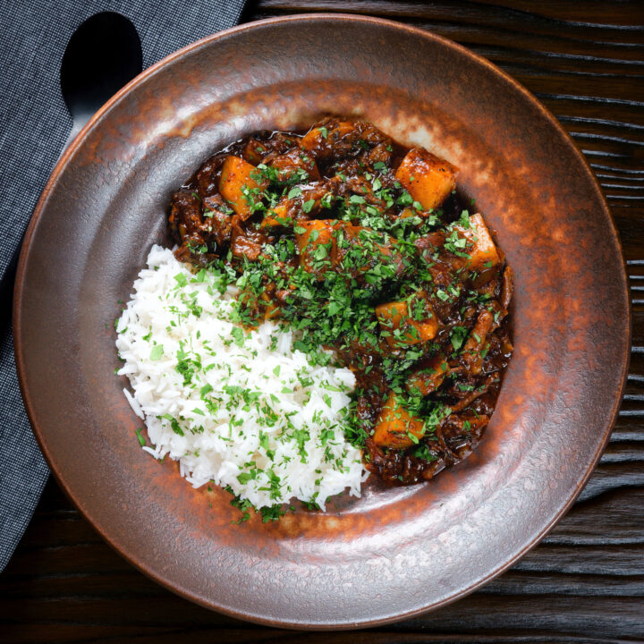 Indian-influenced oxtail and potato curry, served with rice and fresh coriander.