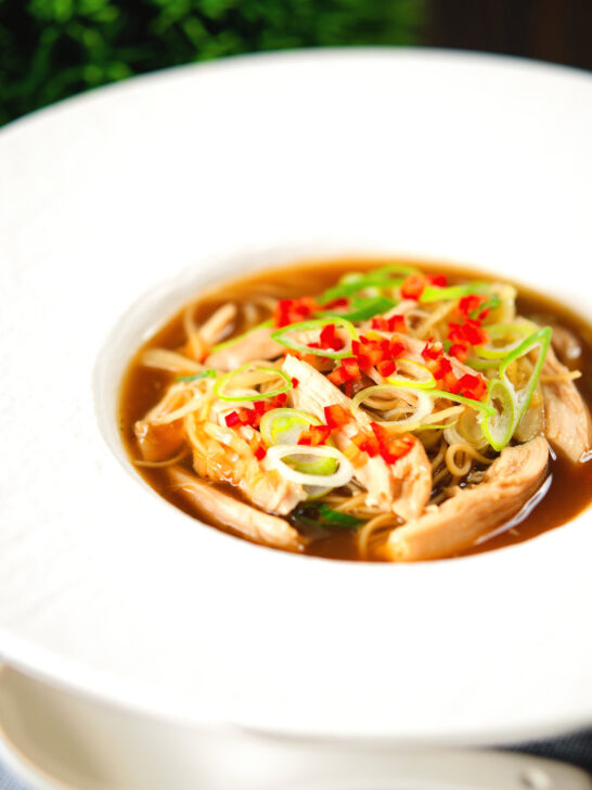 Chinese influenced spicy leftover roast chicken soup with noodles.