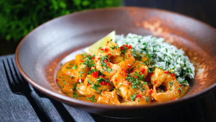 Indian influenced prawn and mango curry served with lime and coriander rice.