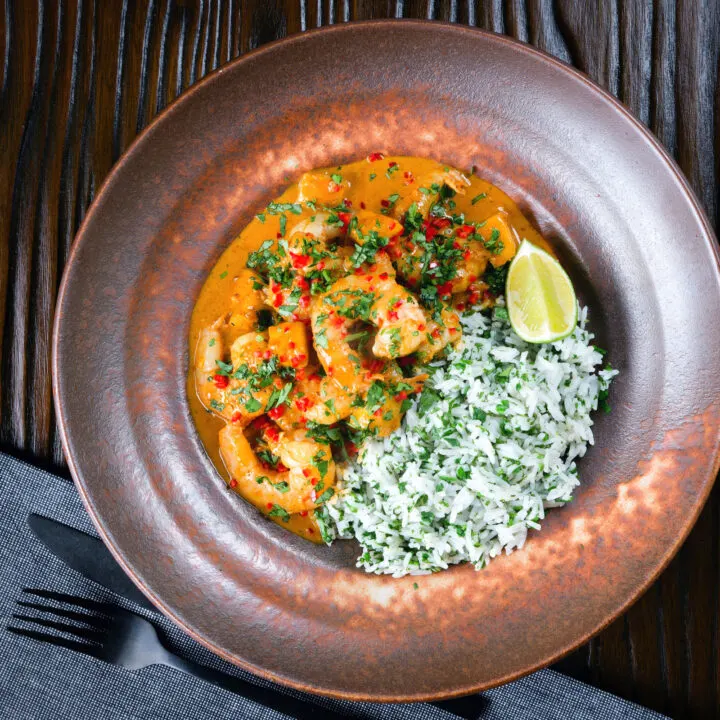 Indian influenced prawn and mango curry served with lime and coriander rice.