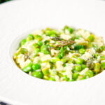 Creamy spring broad bean, pea and asparagus risotto.