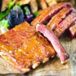 Apricot jam and mustard glazed bacon ribs served with air fryer potato wedges.