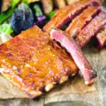 Apricot jam and mustard glazed bacon ribs served with air fryer potato wedges.
