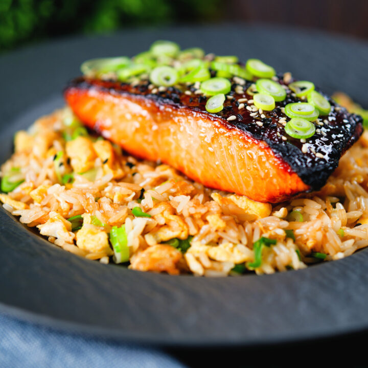 Honey and miso glazed grilled salmon fillet served with egg fried rice.