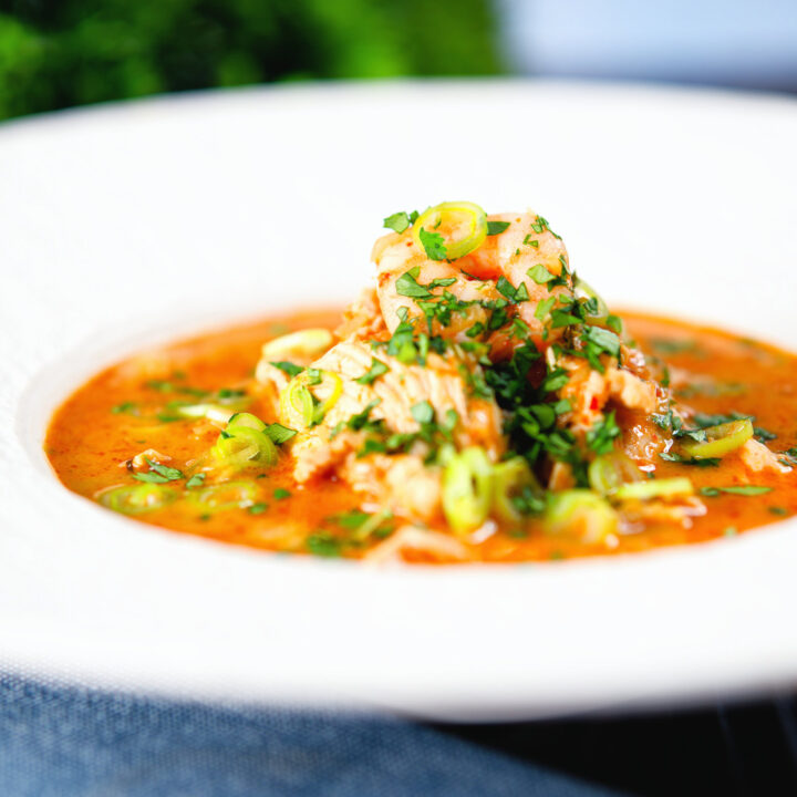 Thai influenced chicken and prawn soup with coconut milk.