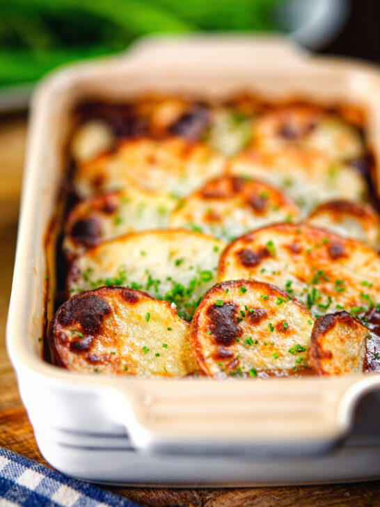 Close-up individual vegan mushroom hotpot topped with potatoes (Lancashire) style.