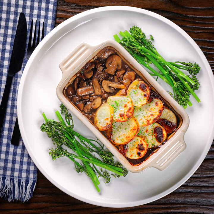 Vegan mushroom Lancashire style hotpot served with roasted broccoli.